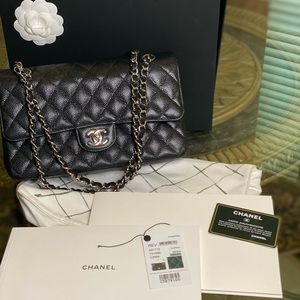 Chanel large classic caviar black double flap bag.